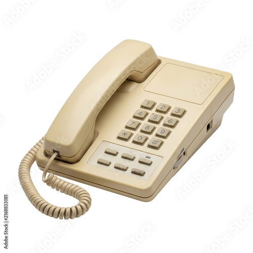 Beige landline telephone on white background