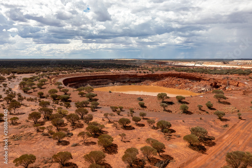 Fotografie Waterhole of a gold mine in the Murchison region, aerial view, Western Australia