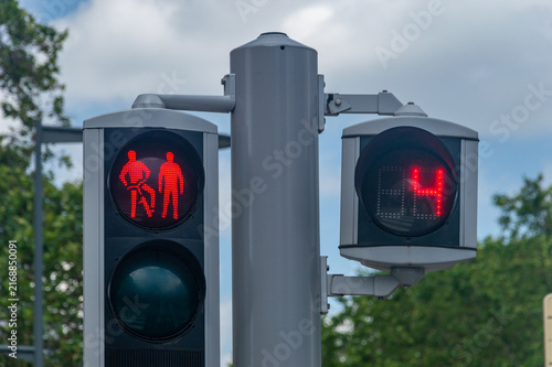 Red traffic light for cyclists and pedestrian with timer.