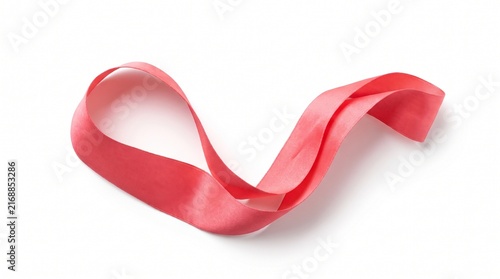 A vibrant pink breast cancer awareness ribbon captured in a graceful waving motion, fabric flowing naturally with curved folds, isolated against a completely plain white background, soft realistic 