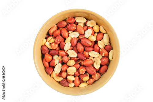 Peanuts in a bowl isolated on a white background. Healthy snacks. Great for advertisements. Rich in magnesium and B vitamins. Top view.