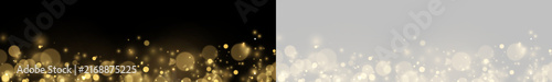 Soft bokeh lights create a shimmering golden particle effect across a dark horizontal background. The circular light spots vary in size and diffuse glow intensity.