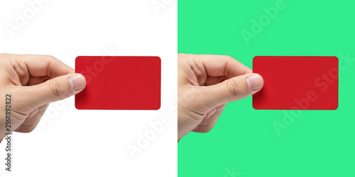 A hand holding a blank red rectangular business card against contrasting backgrounds