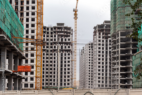 Fotografía Monolithic concrete frames of modern residential complex apartments under construction during a massive real estate and housing boom in Bishkek, Kyrgyzstan