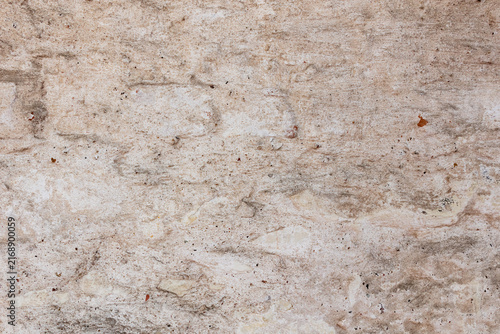 Rough beige plaster wall texture background