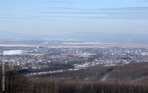Konstfotografi Winter aerial view of Arsenyev city from mountain top