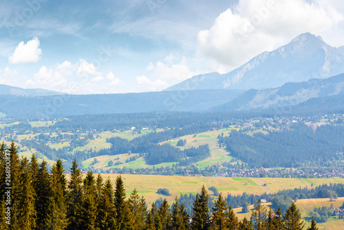 mountain landscape of Poland in late summertime. wonderful view of High Tatra ridge above Zakopane village valley. vacation place in Europe