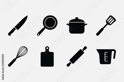 Black silhouettes of essential kitchen tools and utensils on a white background