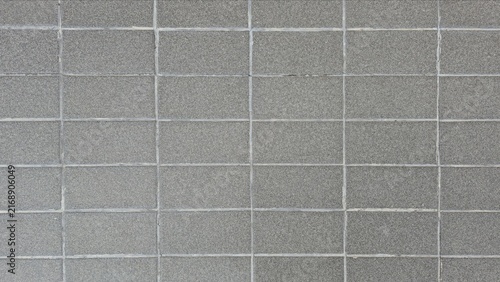 фотографія Grey concrete block flooring texture background grid pattern