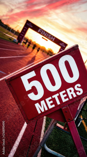 Athletic Track Finish Line approaching 500 Meters Sport Competition Sunset