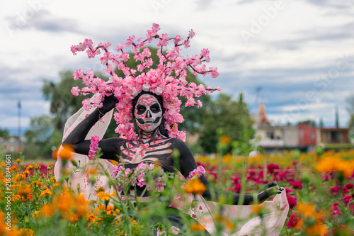 Catrina Portrait Through Marigolds and Celosia