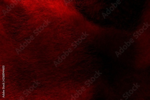 Canvas Print red woollen soft sinews on black background