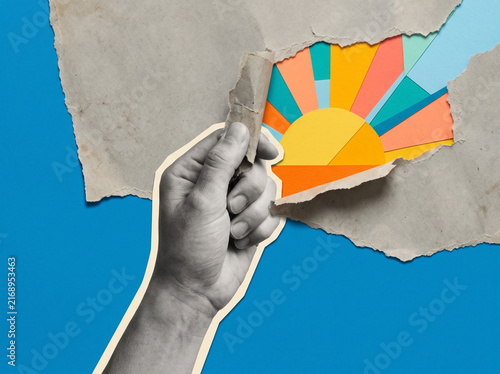 Mixed media collage of grayscale hand tearing paper to reveal colorful geometric sun with retro print texture