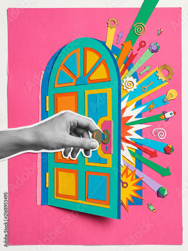 Grayscale hand opening colorful paper door with arrows gears keys and creative collage objects