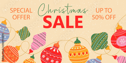 Christmas sale banner with colorful ornaments, special offer, and discount text. Festive retail background with space for text.