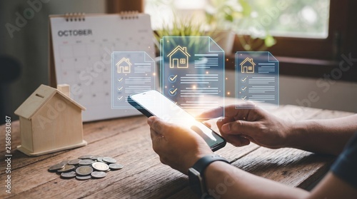 Businessman using smartphone to review digital real estate documents, mortgage contracts, and property loan agreements online