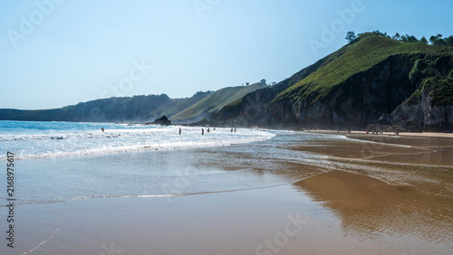 Summer scene at Beach of La Franca, Asturias, Spain