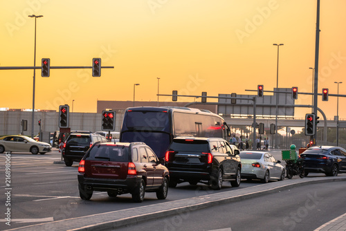 Bild auf Leinwand Dense traffic jam filling multiple lanes of a busy city roadway, illustrating vehicle congestion, commuting delays, urban transportation challenges, and peak-hour travel conditions