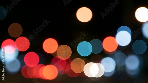 Vibrant Blurred Colorful Lights Bokeh Background with Glowing Circles, Festive Night Illumination and Abstract Light Leaks for Design