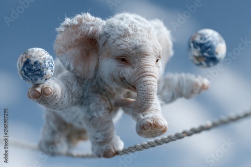 Cute Baby Elephant Balancing Globes on Tightrope