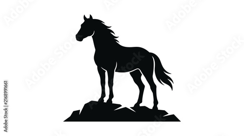 Canvas Print Black silhouette of a strong horse standing proudly on a rocky mountain peak for