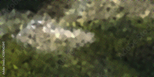 Fotografie A close up view of a textured green fabric surface with a distinct grid pattern