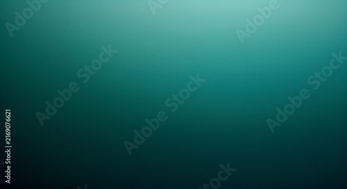 A smooth gradient background transitioning from dark teal to a lighter muted turquoise hue high-quality