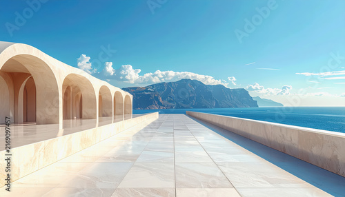 Modern white arched colonnade overlooking a vast blue ocean and distant mountains