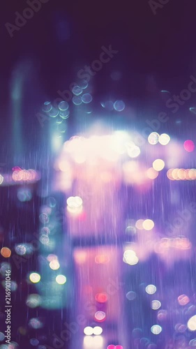 Abstract bokeh lights with a vertical camera angle, creating a dreamy video effect. Live mobile wallpaper.