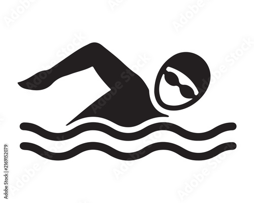 Obraz na plátne Swimmer silhouette with goggles swimming freestyle in water waves