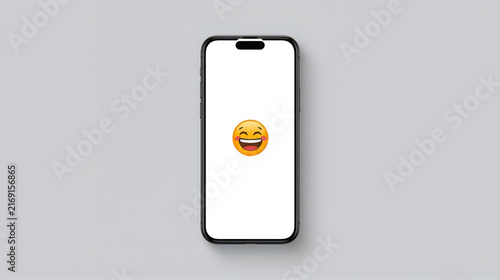 Smartphone with laughing emoji on white screen isolated on gray background