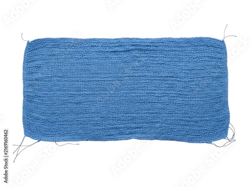 A rectangular piece of textured blue fabric isolated on a white background