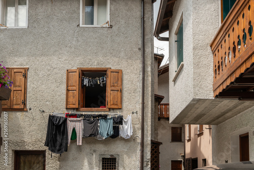 Alleghe, Italy. Laundry drying outside a traditional alpine house in a mountain village