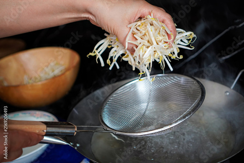 Canvastavla Blanching Fresh Bean Sprouts in Boiling Water During Home Cooking