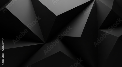 Abstract geometric black surface with sharp triangular shapes and dramatic lighting for modern architectural design concept