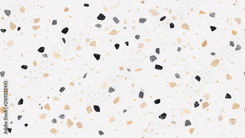 White terrazzo texture with black, grey, and beige stone chips
