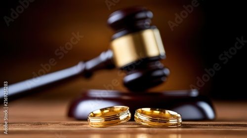 Symbolic representation of divorce with wedding rings and gavel