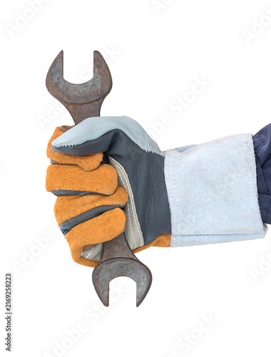 Hand in glove holding spanner on white Background
