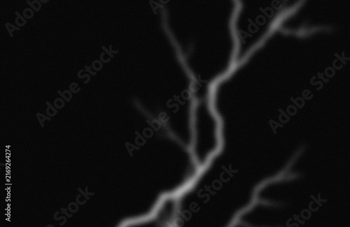 Photography Lightning striking against dark stormy sky