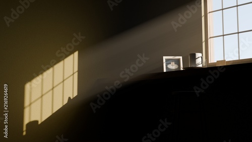 Bild auf Leinwand Dramatic sunset volumetric light beam streaming through a window into a dark, pe