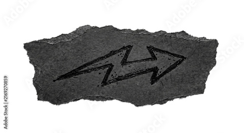 Fotografía Hand drawn lightning bolt symbol on torn dark paper texture