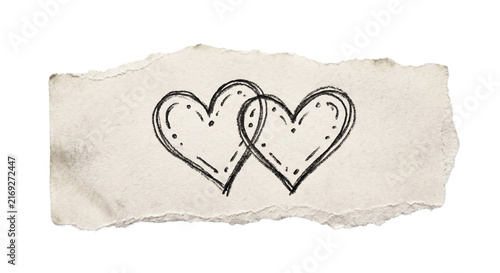 фотографія Hand drawn interlocking hearts on torn paper, a symbol of connection and love