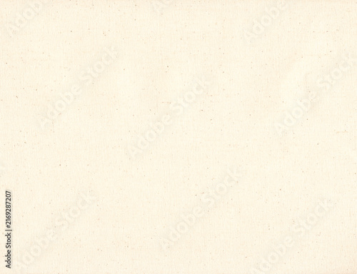 Unprimed cotton canvas texture. Natural beige raw woven fabric surface background with specks. Perfect for eco-friendly packaging, art mockups, or rustic graphic design.