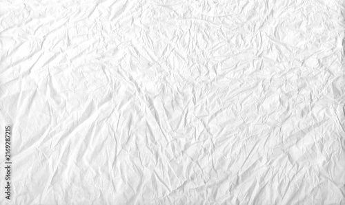 White crumpled paper texture. Detailed abstract creased surface background. Ideal for graphic design, mockups, photo overlays, packaging, or scrapbook backgrounds.