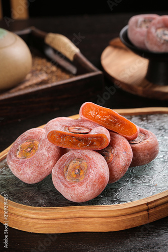 Korean Dried Persimmons with Sugar Coating on Wooden Tray - Traditional Sweet Confectionery