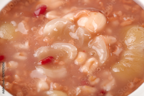 Fotografie Sweet lotus seed congee with silver ear fungus and goji berries - traditional As