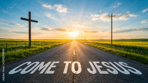 Bold 'Come to Jesus' text on a rural road leads toward a cross and brilliant sunrise horizon in open fields