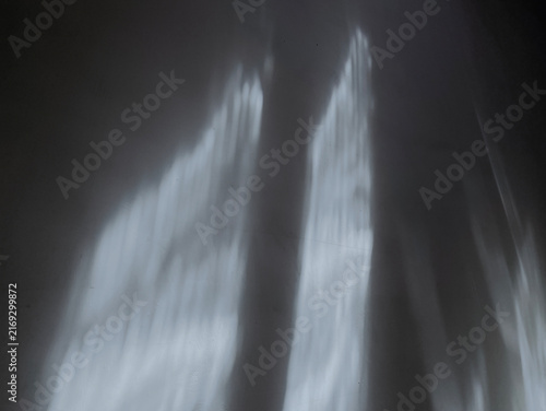 Wall background with sunlight. Natural sunlight with shadow wall.