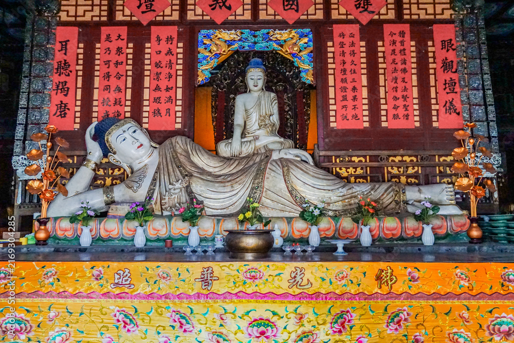 Fototapeta premium Reclining Buddha Statue at Wutai Mountain Temple, Shanxi, China