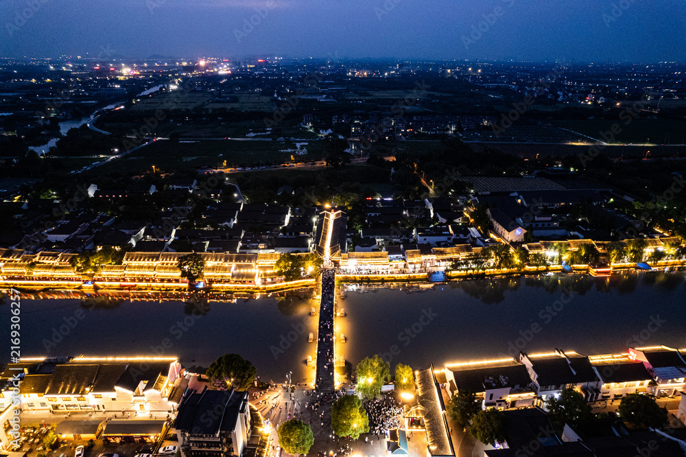 Fototapeta premium Tangqi Ancient Town Hangzhou at Night - Aerial View